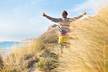 Image showing Free active man enjoying beauty of nature.