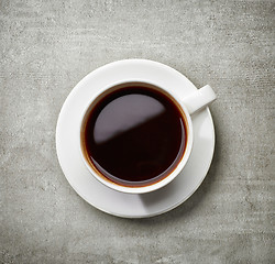 Image showing cup of coffee on gray table