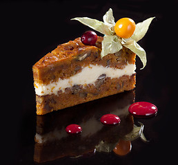 Image showing slice of cake on black background