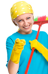 Image showing Young woman as a cleaning maid