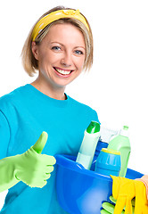 Image showing Young woman as a cleaning maid