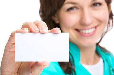 Image showing Doctor is showing her business card