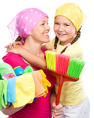 Image showing Mother and her daughter are dressed for cleaning