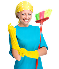 Image showing Young woman as a cleaning maid