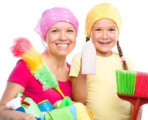 Image showing Mother and her daughter are dressed for cleaning