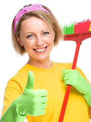 Image showing Young woman as a cleaning maid