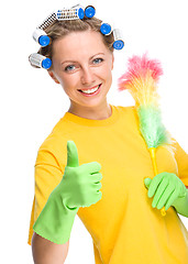 Image showing Young woman as a cleaning maid