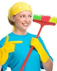 Image showing Young woman as a cleaning maid