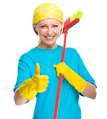 Image showing Young woman as a cleaning maid