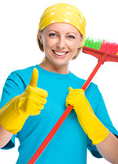 Image showing Young woman as a cleaning maid