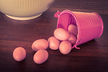 Image showing Easter eggs in a violet bucket