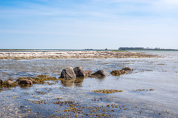 Image showing Seashore with rocks in the water