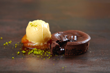 Image showing chocolate fondant with mango sorbet