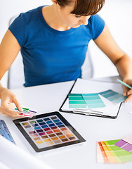 Image showing woman working with color samples for selection