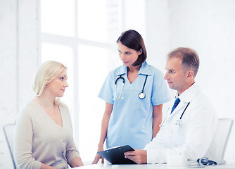 Image showing doctor and nurse with patient in hospital