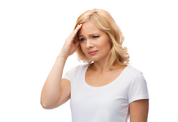 Image showing unhappy woman suffering from headache