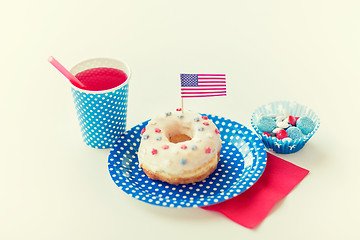 Image showing donut with juice and candies on independence day