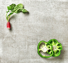 Image showing fresh radish and green paprika slices