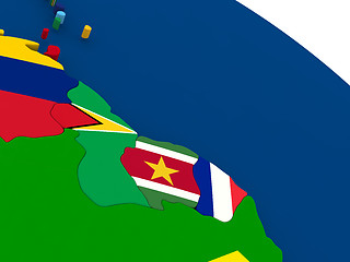 Image showing Guyana, Suriname and French Guiana on globe with flags