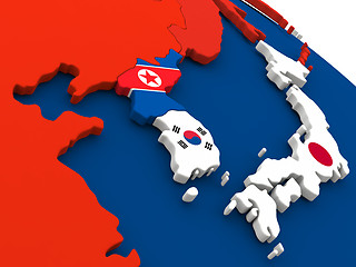 Image showing South Korean and North Korea on globe with flags