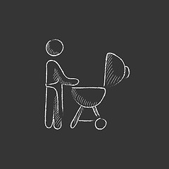 Image showing Man at barbecue grill. Drawn in chalk icon.