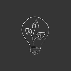 Image showing Lightbulb and plant inside. Drawn in chalk icon.