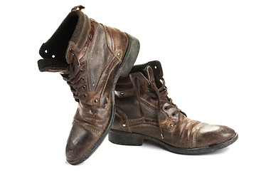 Image showing Dirty old boots isolated. white background