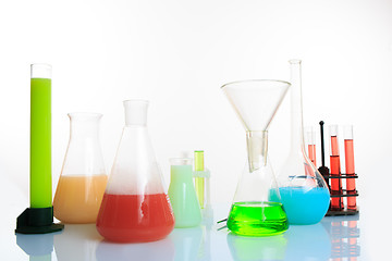 Image showing Test-tubes with liquid on light background