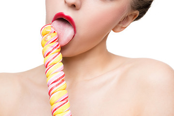 Image showing Close-up shot of woman\'s mouth bright red lips with lollipop. blowjob simulation