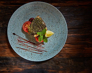 Image showing Fish dish - fried fish and vegetables