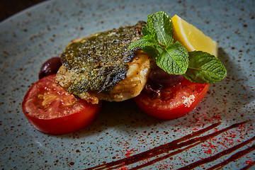 Image showing Fish dish - fried fish and vegetables