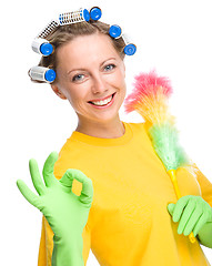 Image showing Young woman as a cleaning maid