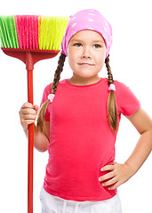 Image showing Young girl is dressed as a cleaning maid