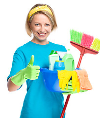 Image showing Young woman as a cleaning maid