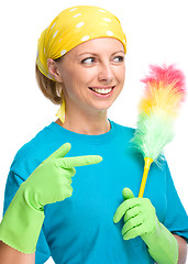 Image showing Young woman as a cleaning maid