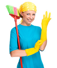 Image showing Young woman as a cleaning maid