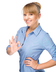 Image showing Woman is showing OK sign