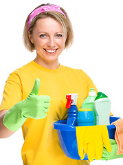 Image showing Young woman as a cleaning maid