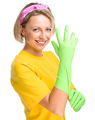 Image showing Young woman as a cleaning maid