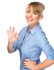 Image showing Woman is showing OK sign