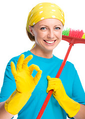 Image showing Young woman as a cleaning maid