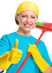 Image showing Young woman as a cleaning maid