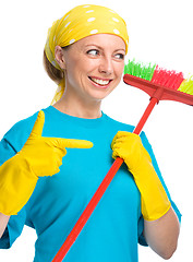 Image showing Young woman as a cleaning maid