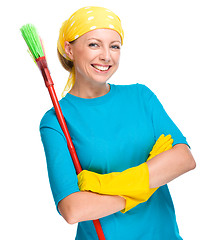 Image showing Young woman as a cleaning maid