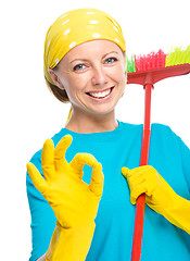 Image showing Young woman as a cleaning maid