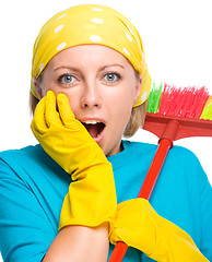 Image showing Young woman as a cleaning maid