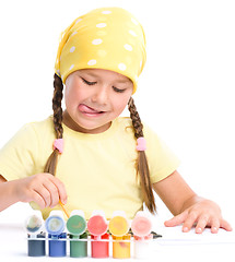 Image showing Cute child play with paints