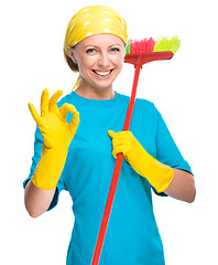 Image showing Young woman as a cleaning maid