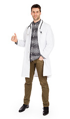 Image showing Happy male doctor showing thumb up