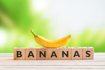Image showing Banana sign with a yellow banana on top